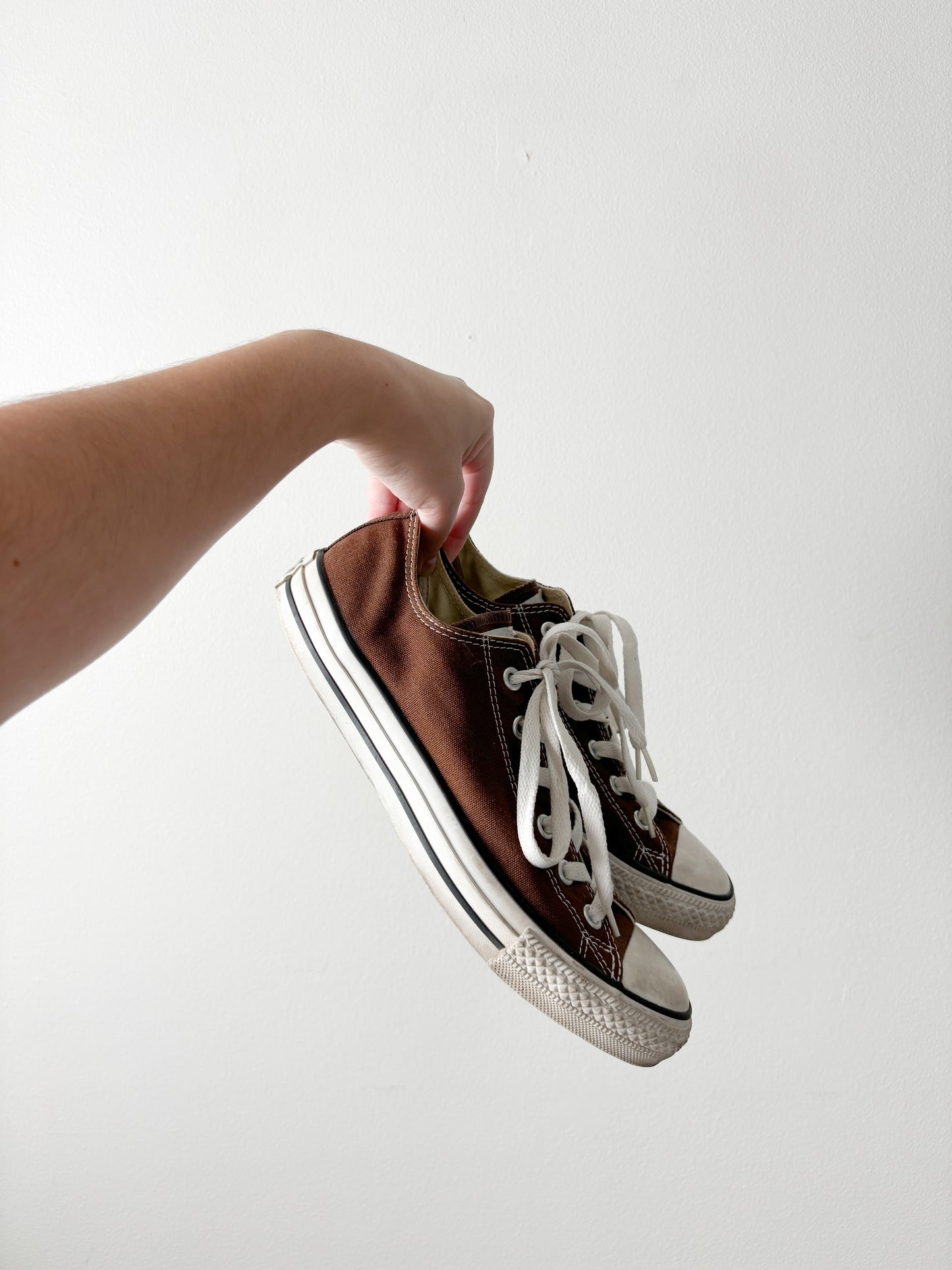 Brown low top converse
