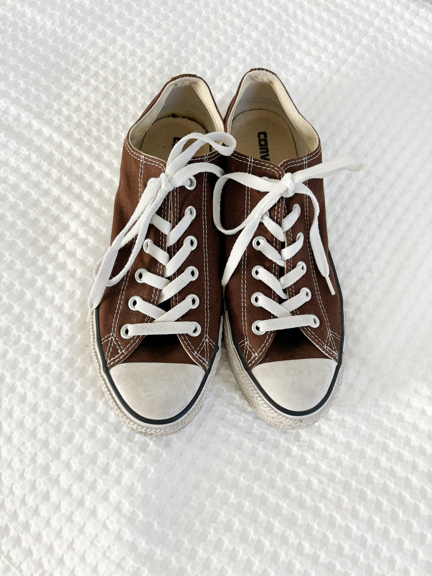 Brown low top converse